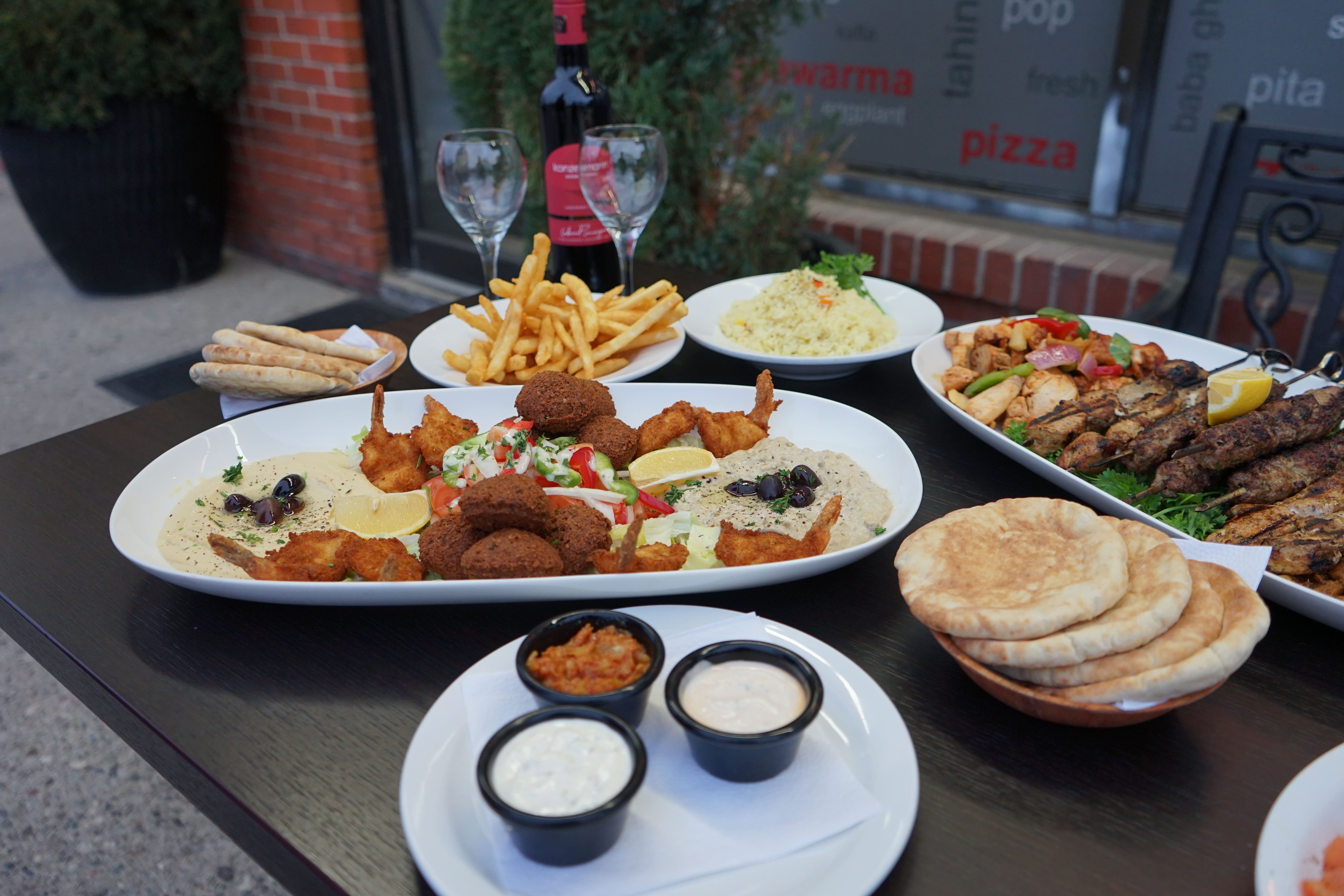 shrimp skewers, fries, pita bread, kafta 
